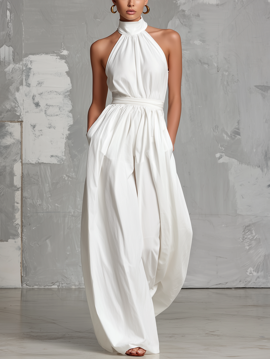 Elegant white woven jumpsuit, sleeveless, with halter neck