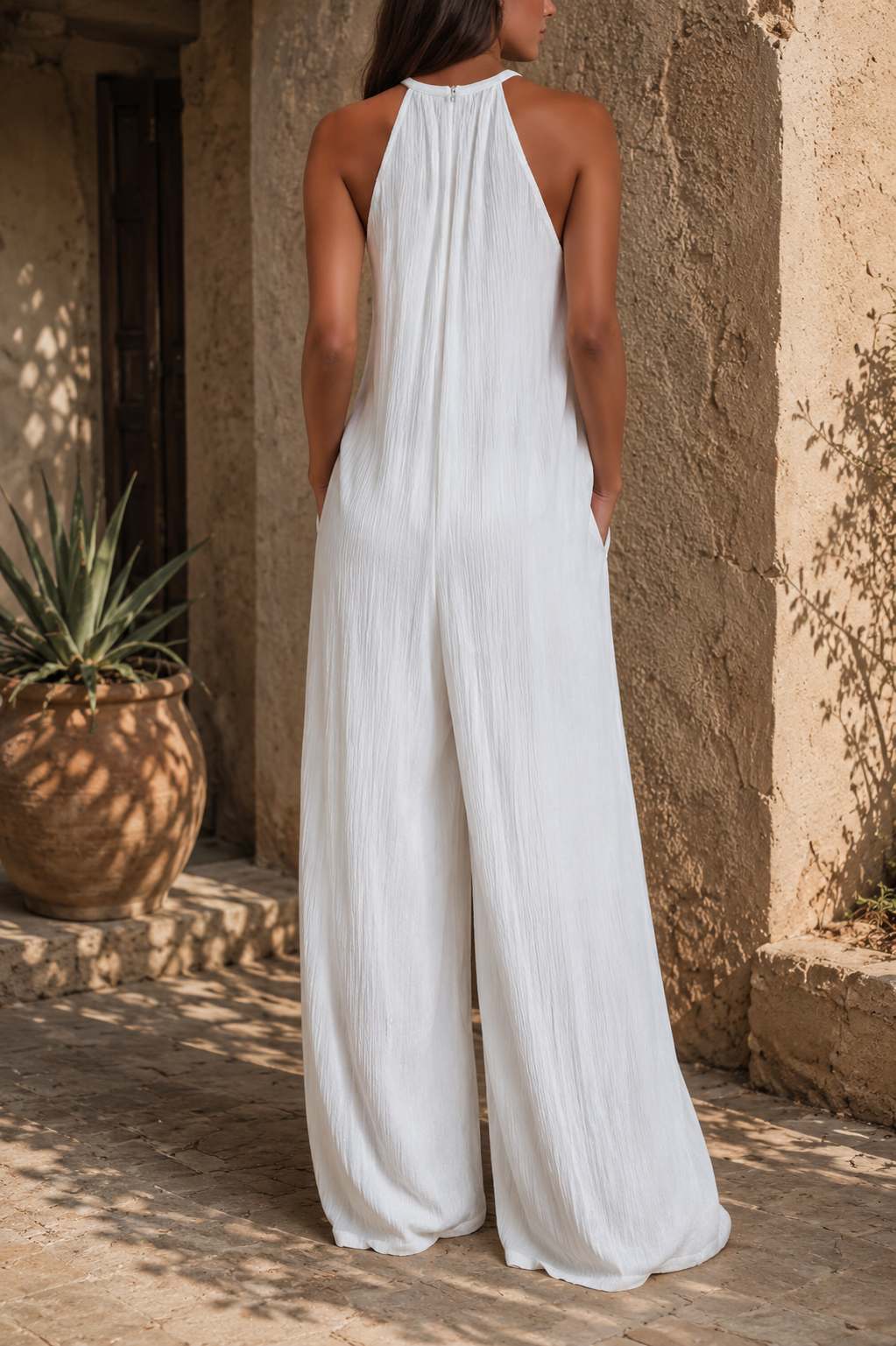 Elegant sleeveless jumpsuit with palazzo pants