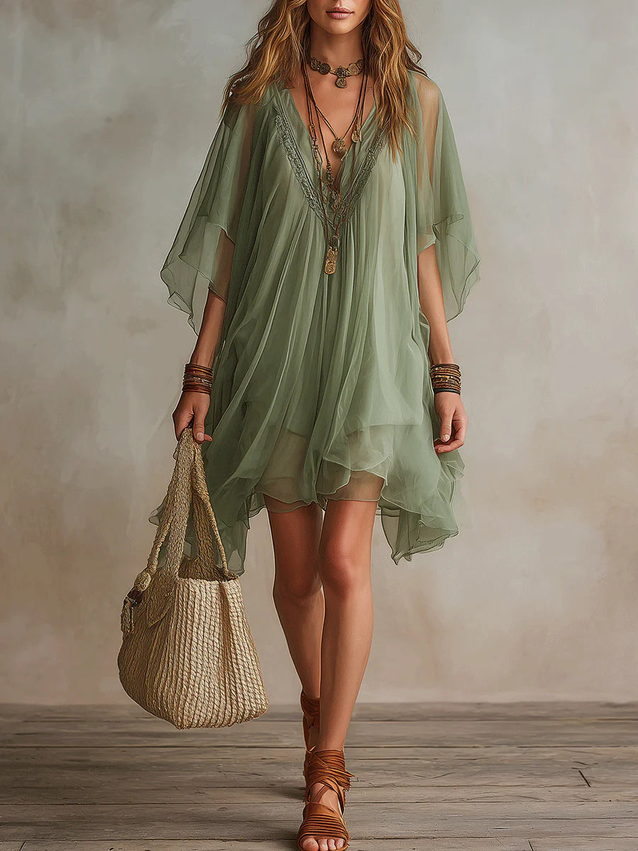 Vestido corto vaporoso de gasa verde con escote en V