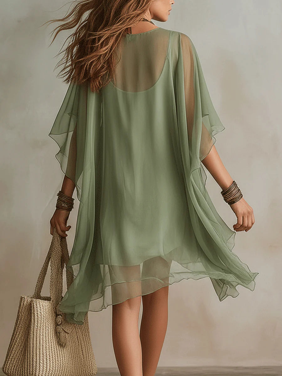Vestido corto vaporoso de gasa verde con escote en V