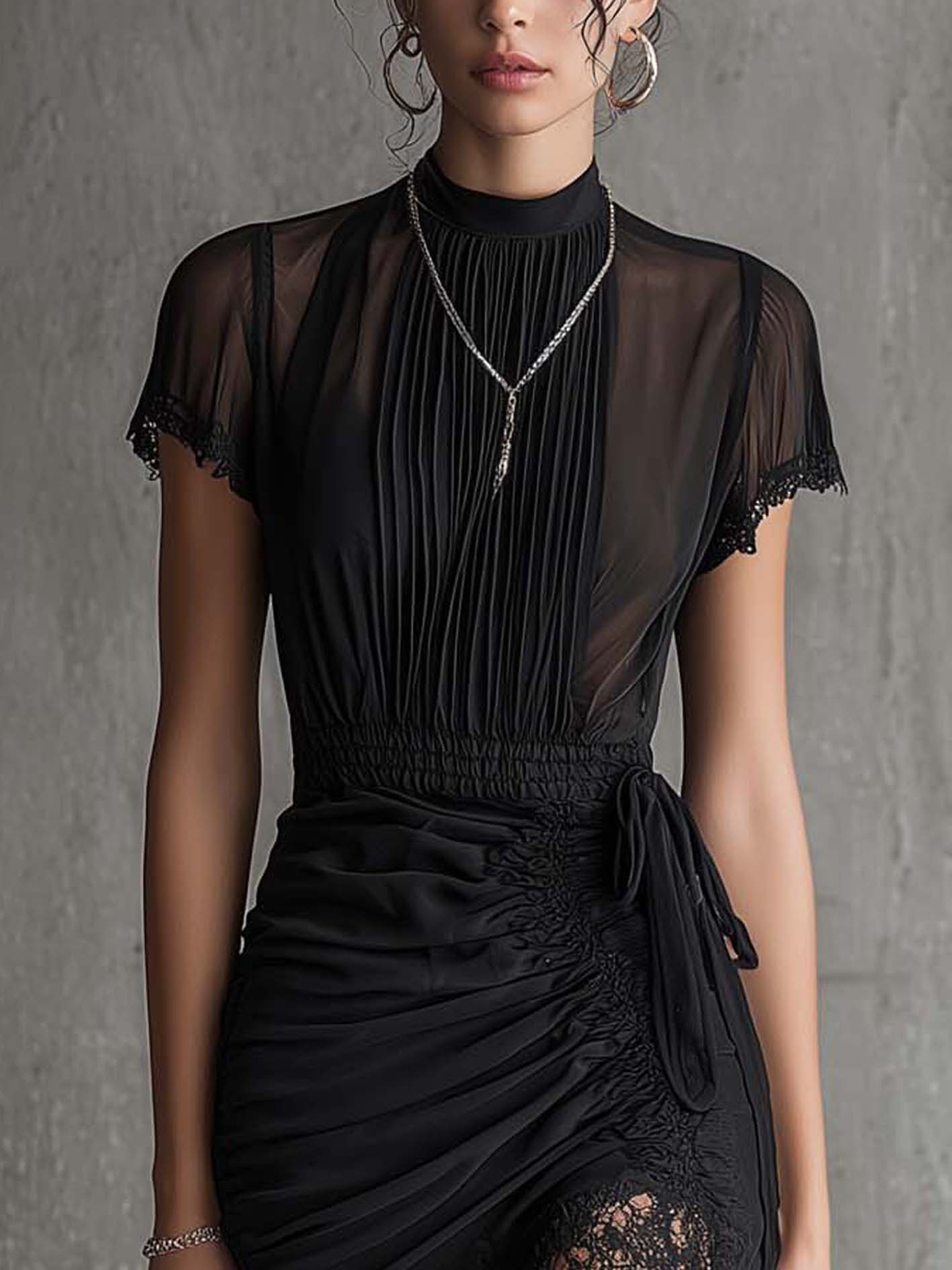 Vestido corto de gasa negro con cintura plisada