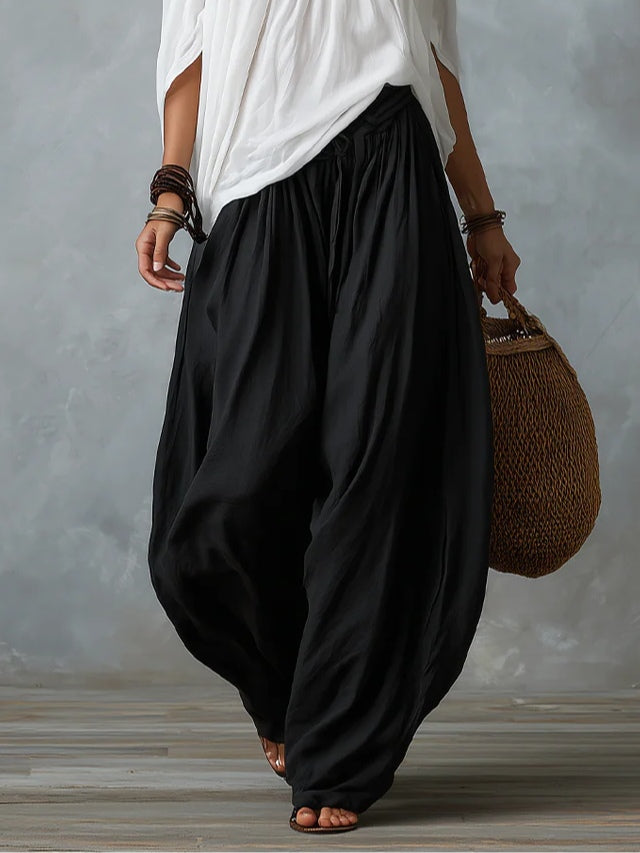 Conjunto de top blanco de hombros descubiertos y pantalón ancho