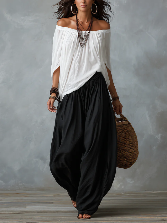 Conjunto de top blanco de hombros descubiertos y pantalón ancho